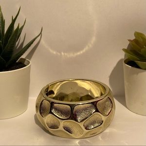 Vintage gold plastic hinged cuff bangle bracelet. Great pre-owned condition.